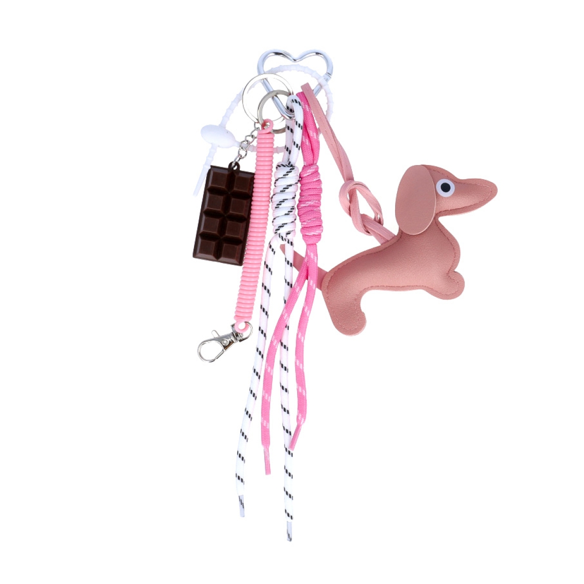 Llavero de la marca MUNNÉ, modelo DOG. Elaborado en piel color rosa con dijes de chocolate y perro salchicha. Complemento perfecto para tu bolso.