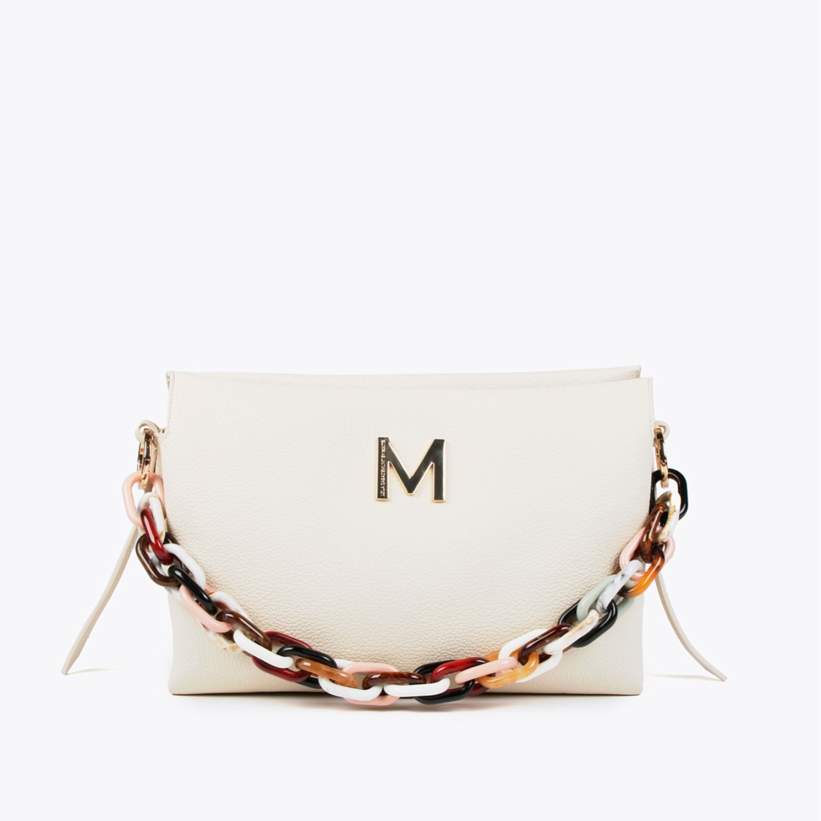 Bolso de la marca Lola Casademunt, modelo INÉS. Bolso grande en efecto piel color beig. Detalle de asa acrílica multicolor. Contiene asa bandolera y compartimento interior con cremallera. Cierre imantado.ALTO: 25 cm - LARGO: 35 cm - ANCHO: 8 cm / BANDOLERA: 145 cm