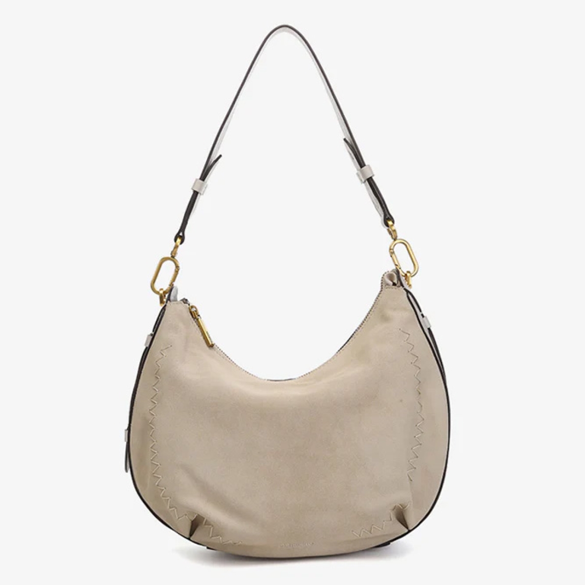Bolso de hombro de la marca Abbacino, modelo BRUNA. Exterior en piel de ante color beig. En su frontal, destacan grandes pespuntes que combinan con su tono principal. Forro interior. Cierre con cremallera. Este bolso Abbacino BRUNA es un modelo en colores atemporales y muy fáciles de combinar que refleja elegancia y un aire clásico.