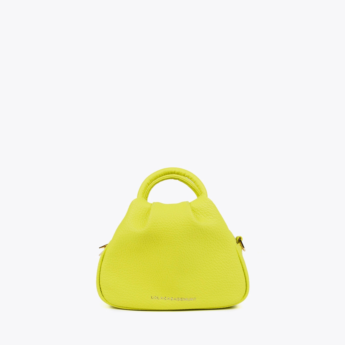 Bolso pequeño bandolera de la marca Lola Casademunt, modelo AMELY. Exterior en piel color fluir con acabado en efecto piel granulada y detalle de bandolera trenzada. Cierre con cremallera. Dimensiones compactas con cremallera segura. Al: 18,5 cm, L: 24,5 cm, An: 8,5 cm, Bandolera: 54 cm. Bolso Lola Casademunt AMELY ideal para esta temporada!