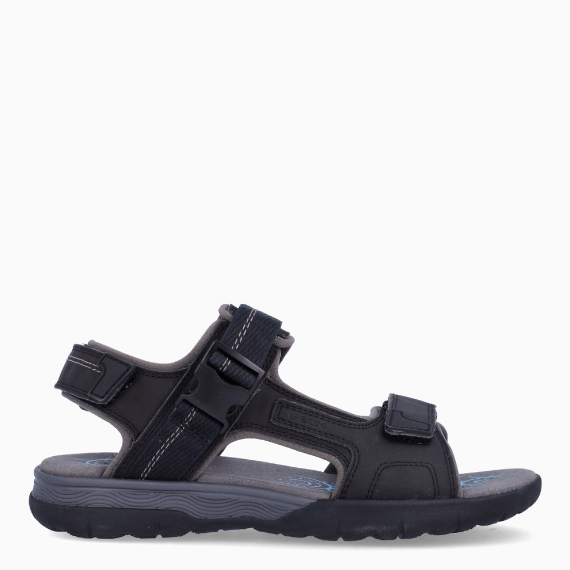 Sandalias de hombre de la marca Geox, modelo SPHERICA EC5 B. Sandalias elaboradas en piel color negro. Sandalias con tiras en pala y cierre en velcro. Interior en piel color nude, acolchado para más comodidad durante el día. Sandalias Geox SPHERICA EC5 B, ideal como básico de todos los días!