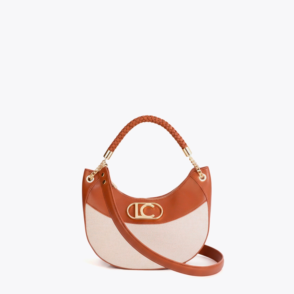 Bolso hobo de la marca Lola Casademunt, modelo AMPARO. Bolso con un diseño bicolor en canvas y efecto piel. Asa trenzada para mayor comodidad, cierre de cremallera y detalles metálicos dorados. Bolso Lola Casademunt con compartimento interno espacioso y detalles de logo en el frente. Bolso AMPARO, ideal para llevar a todos lados!ALTO 17cm ANCHO 27cm PROFUNDIDAD 9cm
