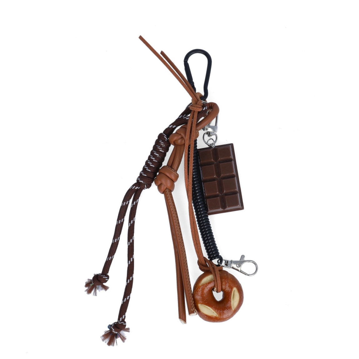 Llavero de la marca MUNNÉ, modelo CHOCOLATINA. Elaborado en piel color marrón con dijes de chocolate y dona. Complemento perfecto para tu bolso.