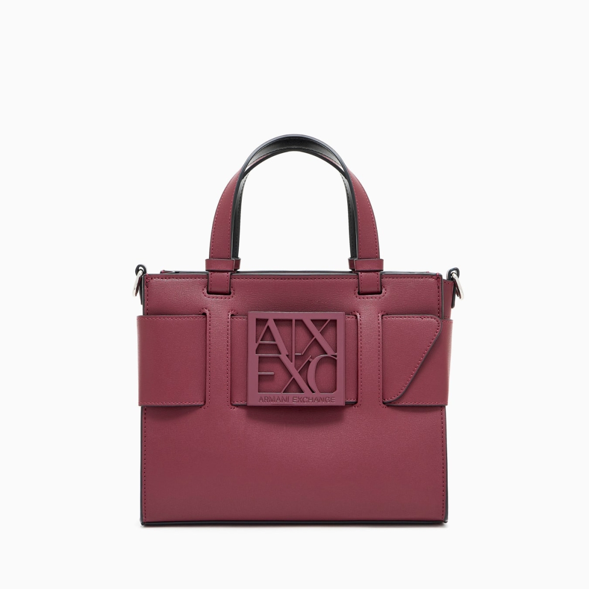 Bolso pequeño clásico de la marca Armani Exchange, modelo CELIA. Este bolso está elaborado en piel de color granate. Es un best seller que se renueva cada temporada, perfecto desde todos los puntos de vista y siempre cool: el bolso tote mediano con bandolera y banda con hebilla con logo personalizado es el accesorio que no puede faltar en el look. Medidas: altura 18cm y ancho 24cm. Bolso Armani Exchange CELIA perfecto para ti!