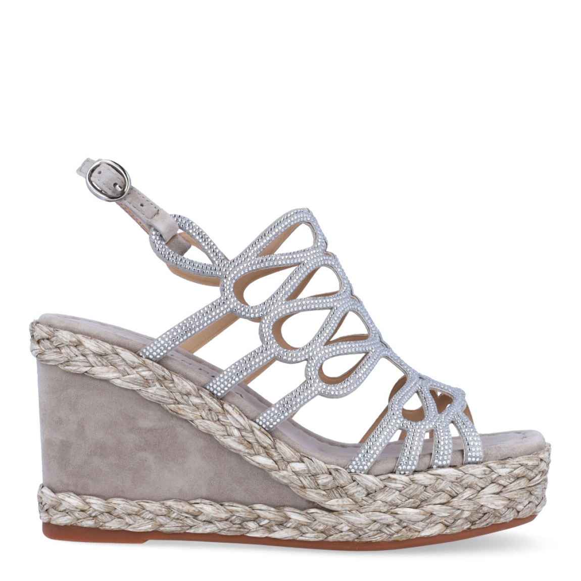 Sandalias de la marca Alma en Pena, modelo GLORE. Exterior en ante color taupe con tiras entrelazadas en toda la pala con detalle de piedrería. Interior en ante color taupe y punta cuadrada. Cierre con hebilla y la altura del tacón es de 9cm. Estas sandalias Alma en Pena son sin dudas, un complemento especial en tus looks, les un estilo único!