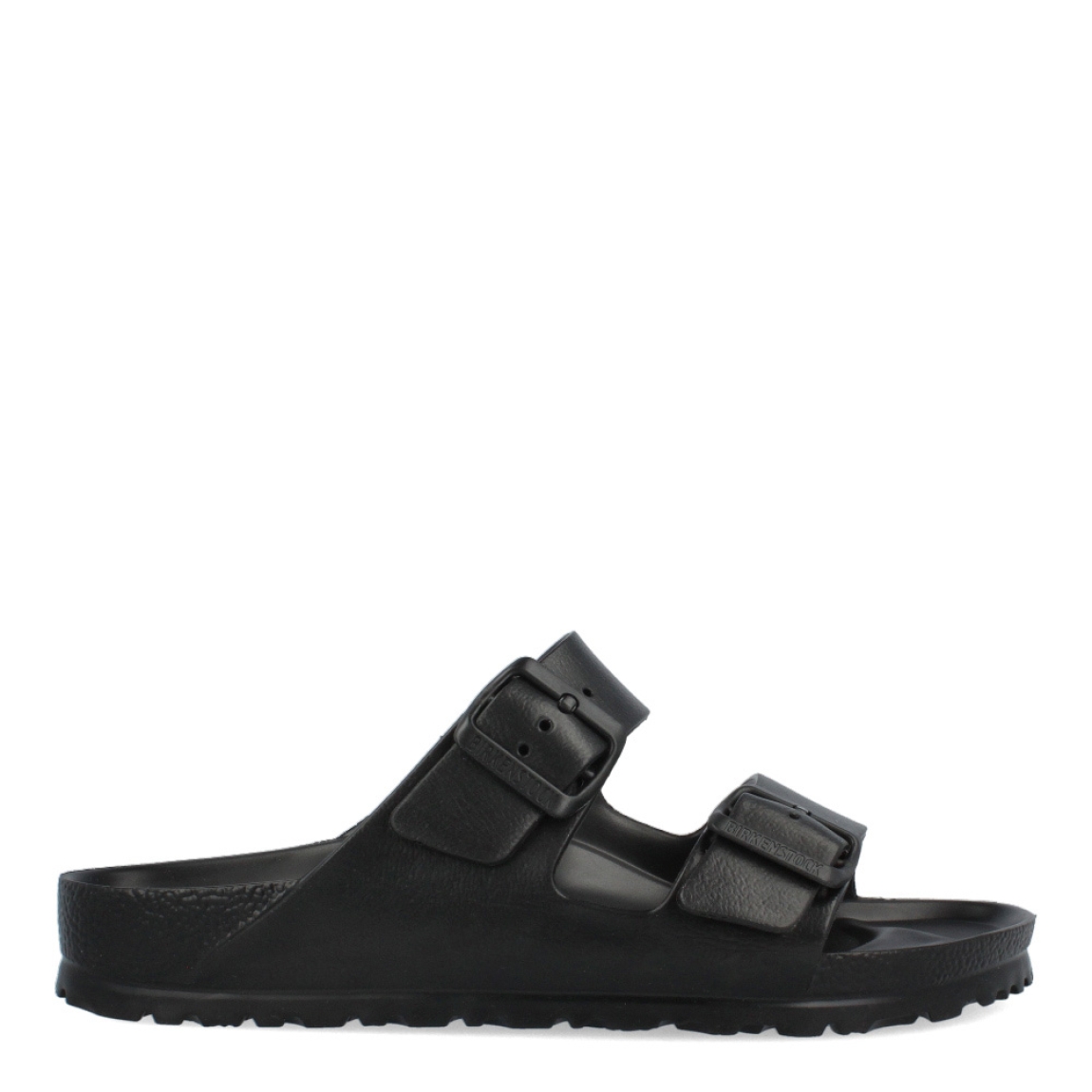 Sandalias de la marca Birkenstock, modelo ARIZONA EVA. Sandalias elaboradas en neopreno de alta calidad color negro. Cierre de las sandalias con doble hebilla, en el empeine y la pala. Sandalias con suela plana y de goma. Estas sandalias Birkenstock ARIZONA EVA son un complemento clásico para esta temporada, podrás combinarlo con diferentes outifts y disfrutar de una comodidad máxima. No te puede faltar en el armario.