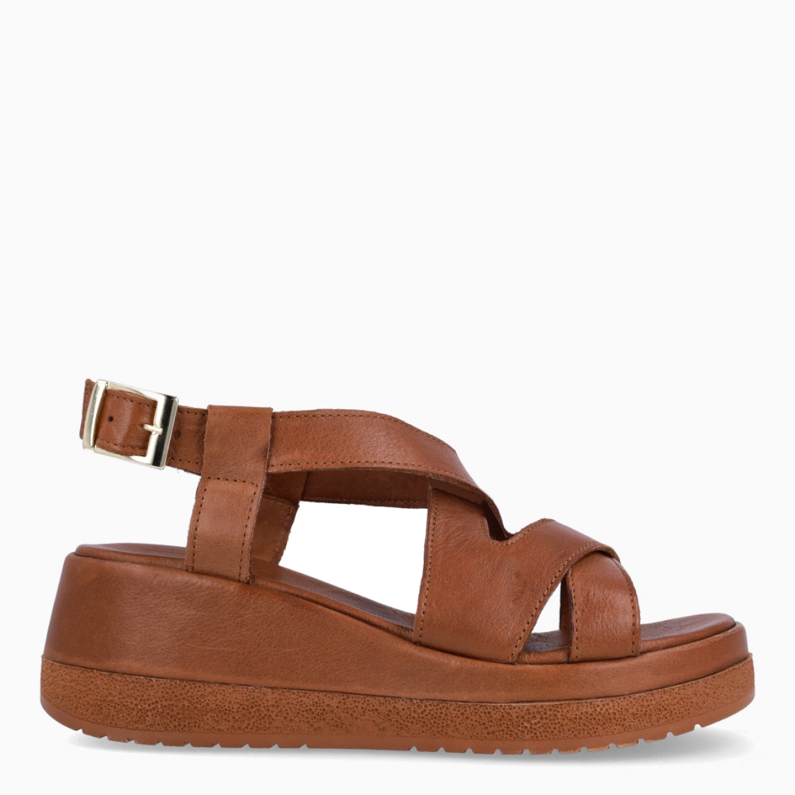 Sandalias de la marca Itse, modelo MIKAELA. Elaboradas en piel color cuero con tiras cruzadas en pala. Interior en piel color cuero con cierre de hebilla en tobillo. Suela con cuña de 6cm de altura. Estas sandalias Itse MIKAELA son unas clásicas, ideales en tu día a día esta temporada!