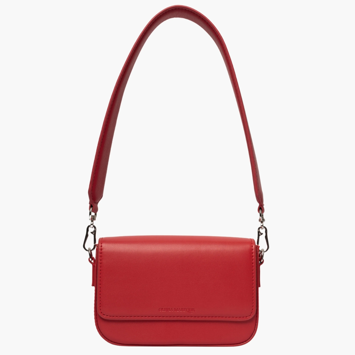 Bolso de la marca Olivia Mareque, modelo PANTONE. Exterior del bolso en piel color rojo. Interio del bolso en piel color rojo con compartimento. Cierre del bolso con imán y asa bandolera extraíble. Medidas del bolso: alto 11cm y ancho 18cm. Este bolso Olivia Mareque PANTONE es el complemento ideal que necesitas en tu armario de temporada. Combinable con todas las asas.