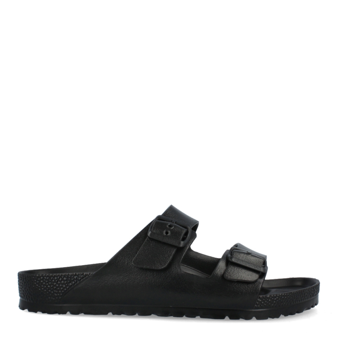Sandalias de la marca Birkenstock, modelo ARIZONA EVA. Sandalias elaboradas en neopreno de alta calidad color negro. Cierre de las sandalias con dos hebillas, en el empeine y la pala. Sandalias Birkenstock con suela plana y de goma. Estas sandalias Birkenstock ARIZONA EVA son un complemento clásico para tus looks de temporada. No te puede faltar en el armario.