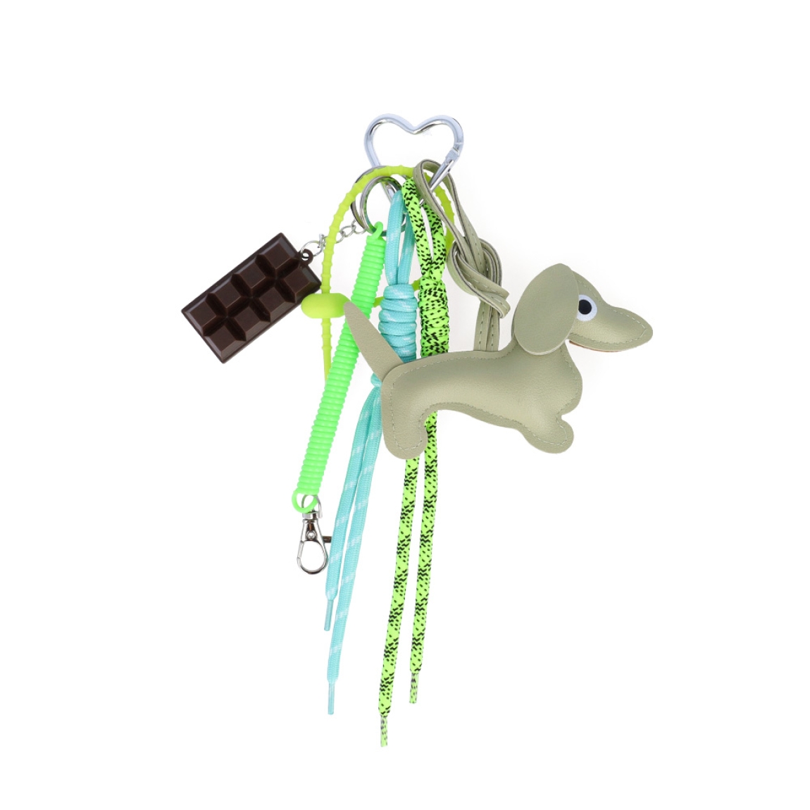 Llavero de la marca MUNNÉ, modelo DOG. Elaborado en piel color verde con dijes de chocolate y perro salchicha. Complemento perfecto para tu bolso.