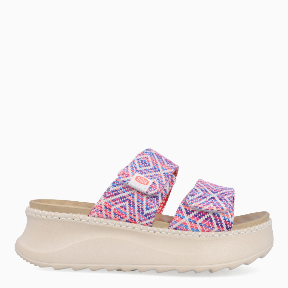 Sandalias de la marca Heydude, modelo DELRAY. Exterior elaborado en tela multicolor con diseños estampados. Interior en piel color camel. Cierre de sandalias Heydude con doble velcro en la pala. Sandalias con cuña de 5cm de altura. Estas sandalias Heydude DELRAY son un complento básico, clásico y cómodo para tu día a día!