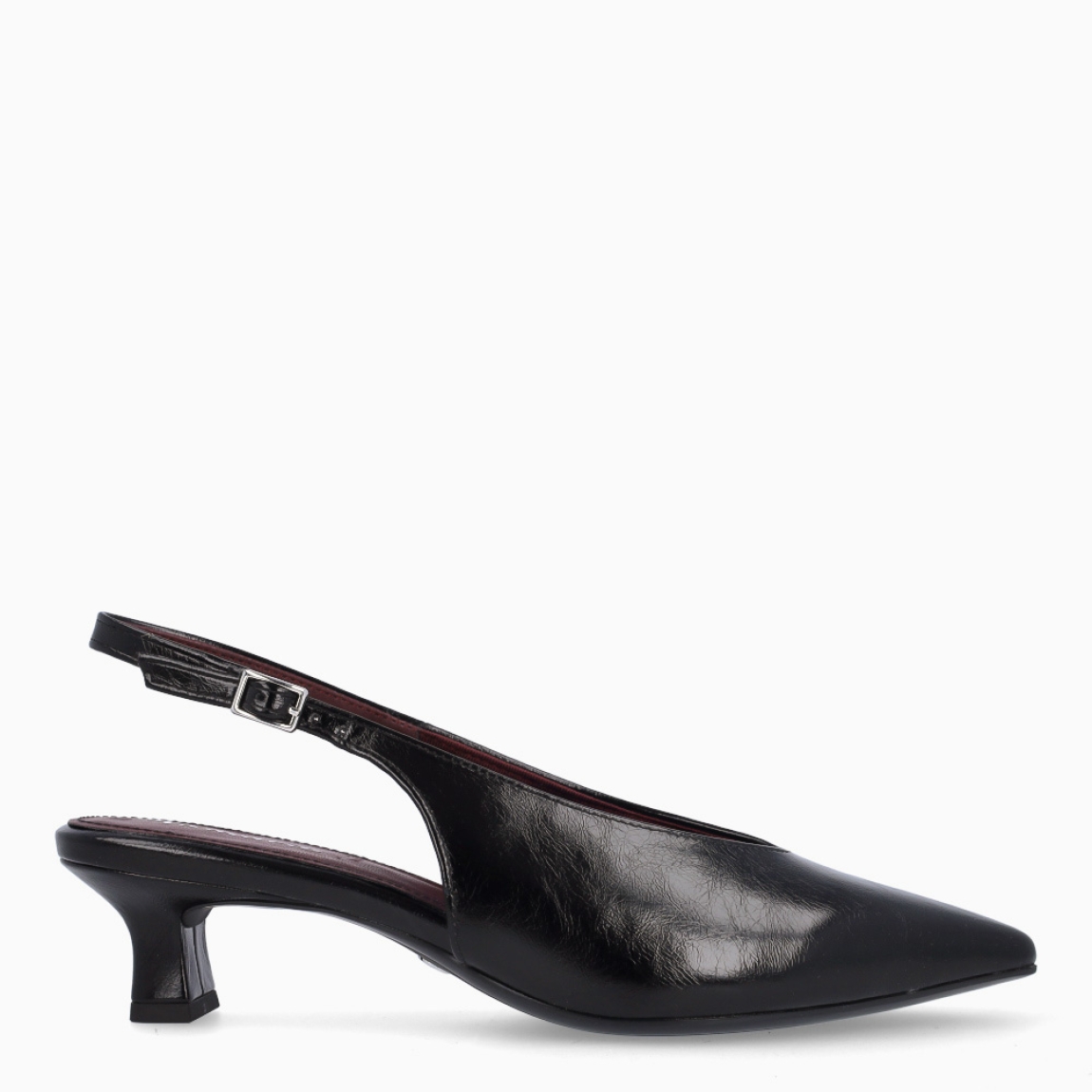 Los salones Tamaris QUEENIE combinan elegancia y comodidad en un diseño perfecto para cualquier ocasión. Están confeccionados en piel de color negro con un sofisticado acabado liso clásico. Incorporan un tacón de 4 cm de altura, ideal para proporcionar una ligera elevación y garantizar el confort durante largas jornadas. Su punta afilada realza la silueta del calzado con un aire refinado y femenino.Cuentan con cierre mediante hebilla ajustable para un ajuste seguro y personalizado, además de una plantilla suave que ofrece una mayor comodidad en cada paso.Los Tamaris QUEENIE son la opción perfecta para transformar cualquier look en un conjunto formal y elegante, sin renunciar a un estilo moderno y versátil.