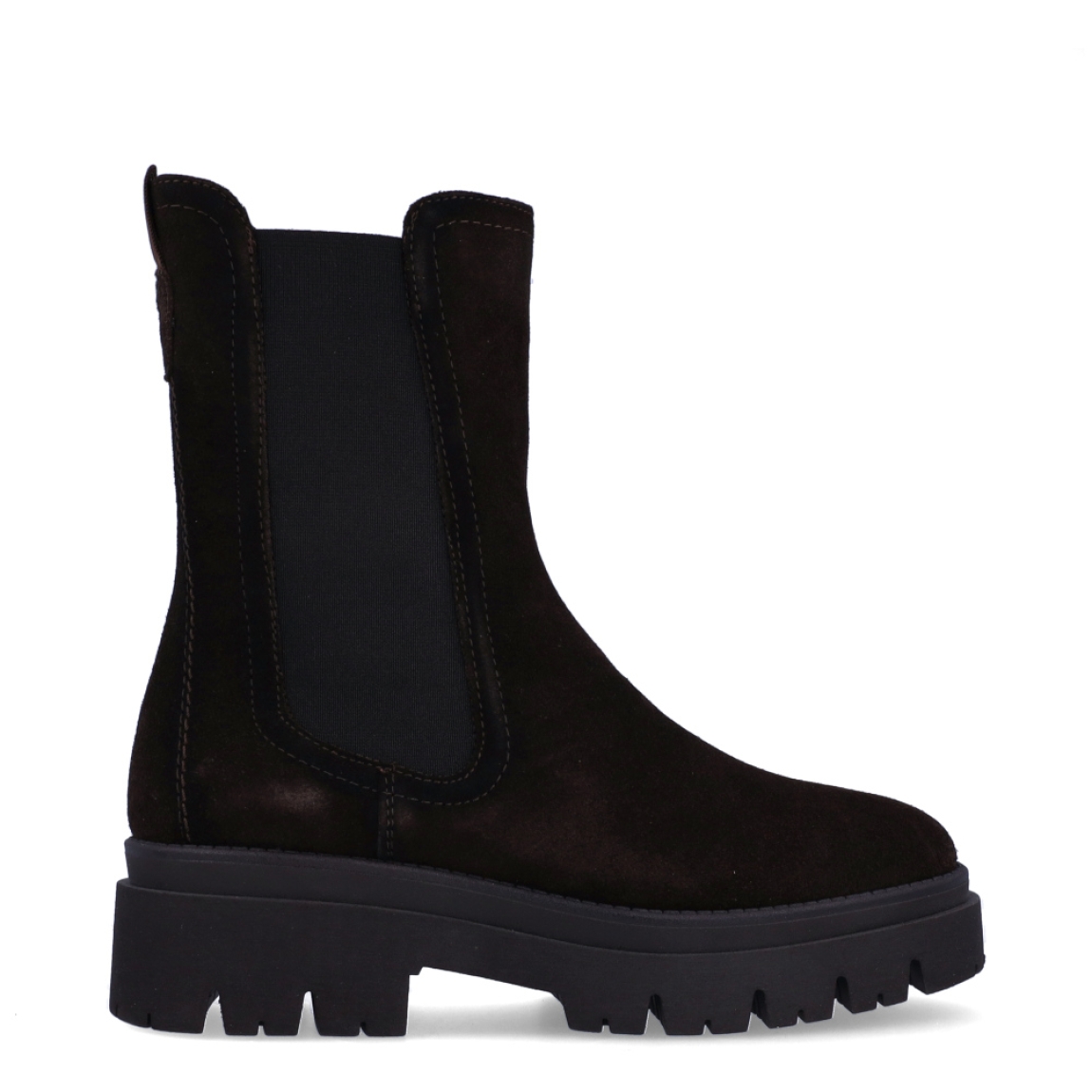 Botines chelsea de caña media de la marca Tamaris, modelo FOREST. Confeccionados en suave piel de ante en un profundo tono marrón oscuro, presentan un diseño depurado con elásticos laterales anchos y tirador trasero para un calce suave y rápido. Incorporan plantilla interior acolchada de alto confort y una suela track de goma dentada con cuña de 5 cm que aísla del frío y garantiza una pisada firme y estable. Combinan genial con tejanos anchos, pantalones de vestir o vestidos midi fluidos con abrigo de paño para un estilismo actual y favorecedor. ¡El fondo de armario imprescindible que aúna tendencia, altura y máxima comodidad!