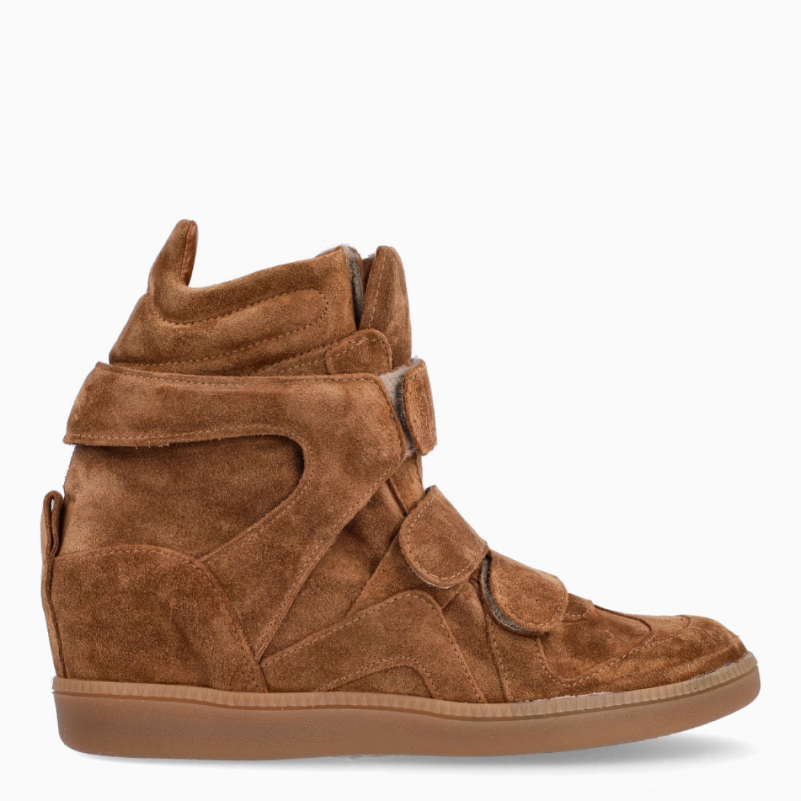 Botines de la marca Itse, modelo G8. Exterior elaborado en ante color cuero con cierre de velcros por toda la pala. Suela de goma con cuña de 6cm. Estas botad Itse son un complemento ideal para esta temporada!