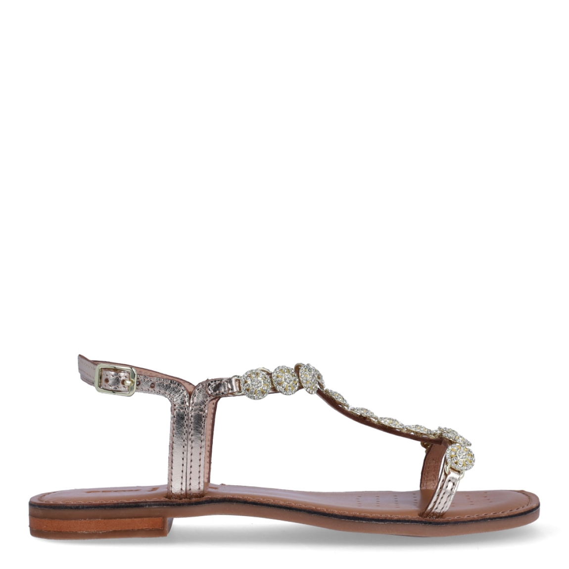 Sandalias de la marca Geox, modelo MEDA. Exterior en piel color oro con aplicaciones de brillantes. Interior en piel color camel. Cierre de sandalias Geox con hebilla. Sandalias con suela plana. Estas sandalias Geox MEDA son unas clásicas, que darán a tu look un estilo único!