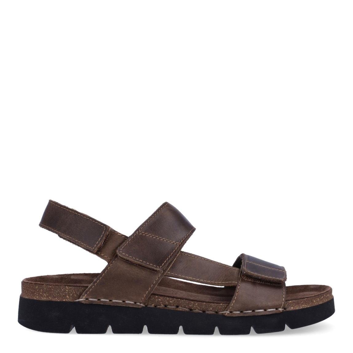 Sandalias de la marca Walk & Fly, modelo LEOR. Exterior de las sandalias en piel color marrón con tiras en pala. Interior de las sandalias en piel color marrón. Cierre de las sandalias Walk & Fly con velcro y suela de goma con 3cm de altura. Estas sandalias Walk & Fly LEOR son un complemento clásico de temporada, te darán una comodidad absoluta. No te puede faltar en el armario.