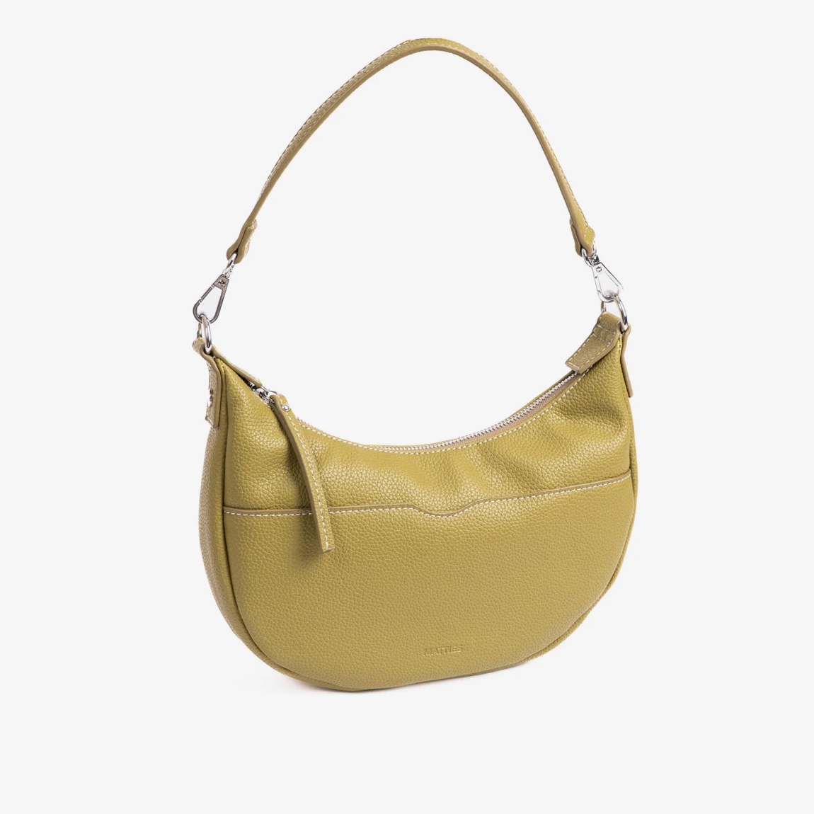 Bolso de la marca Matias Salva, modelo MINNA. Bolso elaborado en polipiel de alta calidad color verde, con un acabado fiel a la piel natural.Tamaño pequeño, ideal para llevar tus imprescindibles. Bolsillos estratégicamente ubicados para llevarlo todo organizado. Bolso Matias Salva, con bandolera desmontable con mosquetones, ajustable en alturaAsa de hombro desmontable. Interior forrado en textil suave al tacto. Bolso Matias Salva MINNA, ideal para llevar a todos lados! Medidas: 24.5x14x05 cm