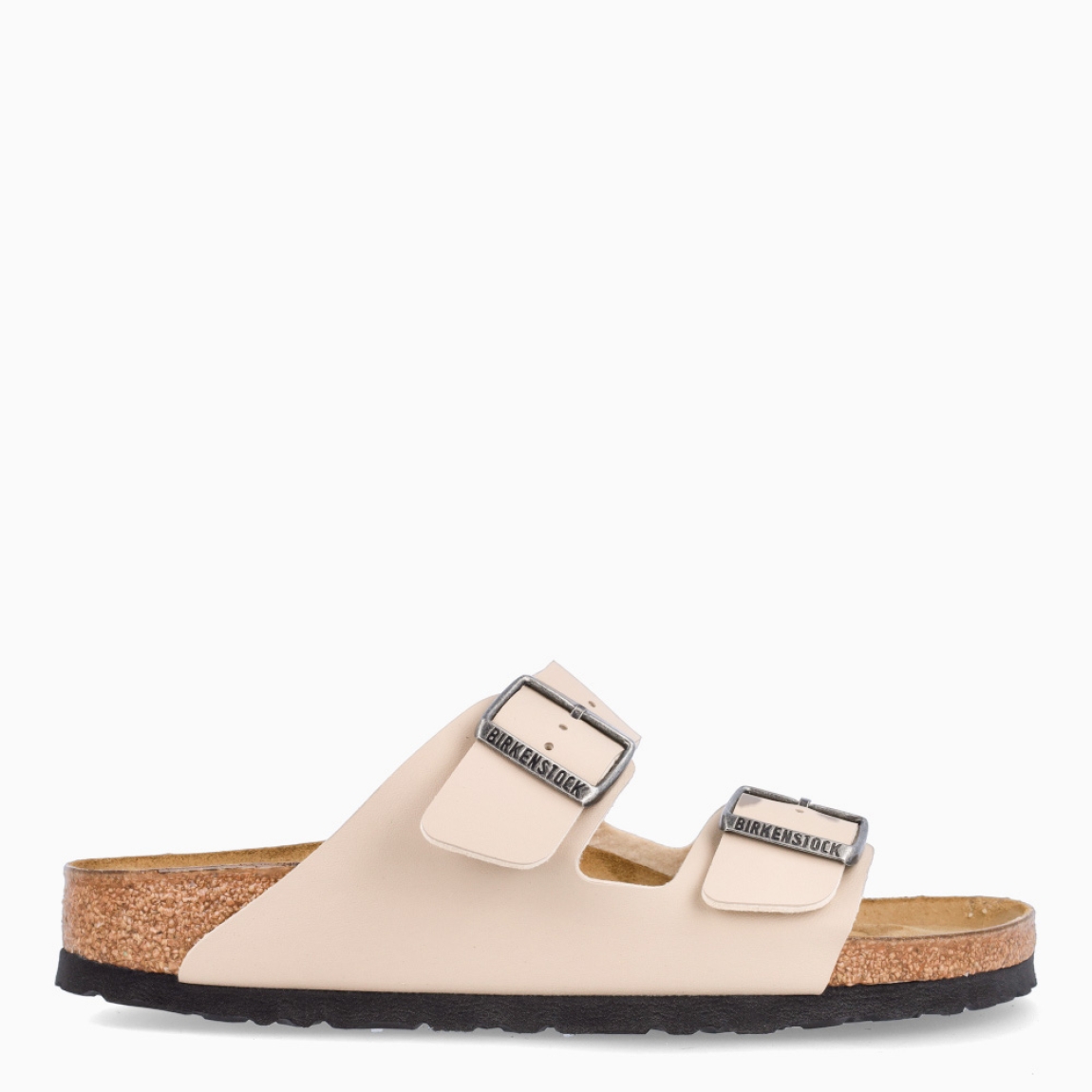 Sandalias de la marca Birkenstock, modelo ARIZONA BIRKO-FLOR. Sandalias elaboradas en ante color beig con una base de corcho y látex de forma anatómica. Cierre de las sandalias con doble hebilla de espiga de metal con ajuste individual. Estas sandalias Birkenstock ARIZONA BIRKO-FLOR es un complemento clásico para tus looks de temporada, con un diseño sencillo atemporal y una ligereza que te dará la comodidad que necesitas en tu día a día.