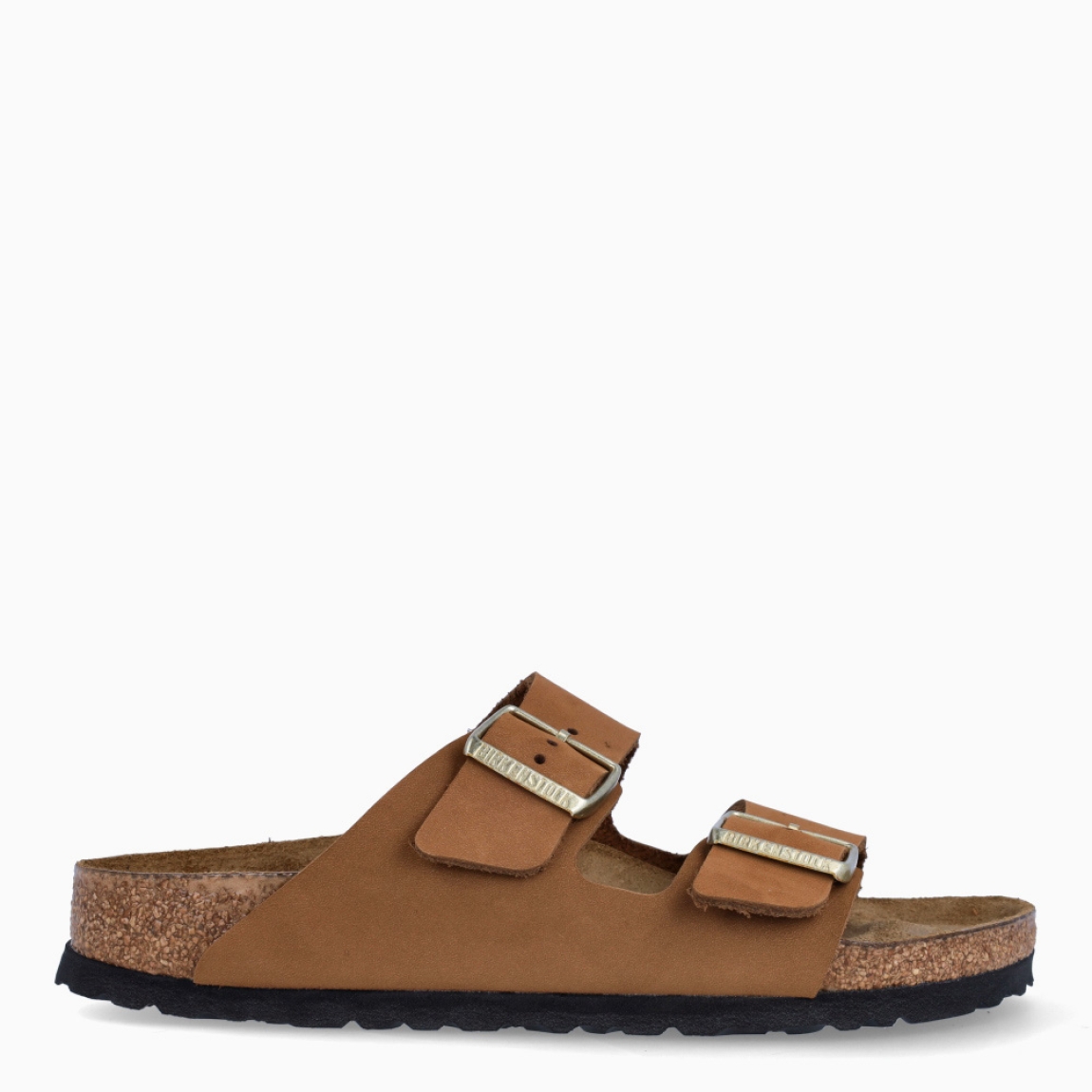 Sandalias de la marca Birkenstock, modelo ARIZONA BIRKO. Sandalias elaboradas en piel de alta calidad color camel, con base de corcho y látex de forma anatómica. Cierre de las sandalias con doble hebilla de espiga de metal con ajuste individual, en empeine y pala. Estas sandalias Birkenstock ARIZONA BIRKO son un complemento ideal para esta temporada, su diseño simple atemporal, lo hace el accesorio clásico para tus looks!