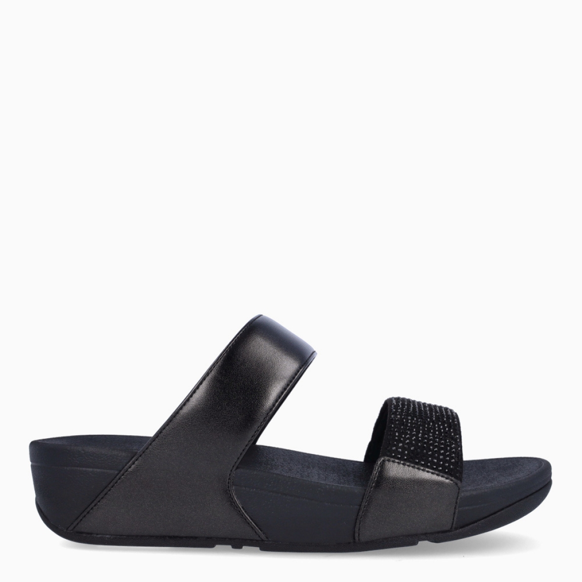 Sandalias de la marca Fitflop, modelo LULU-STRAPS. Sandalias elaboradas en neopreno color negro con brillantes en pala y doble tira. Interior de esclavas en neopreno color negro. Suela de goma con una cuña de 6cm de altura. Estas sandalias Fitflop LULU-STRAPS son ideales para esta temporada!