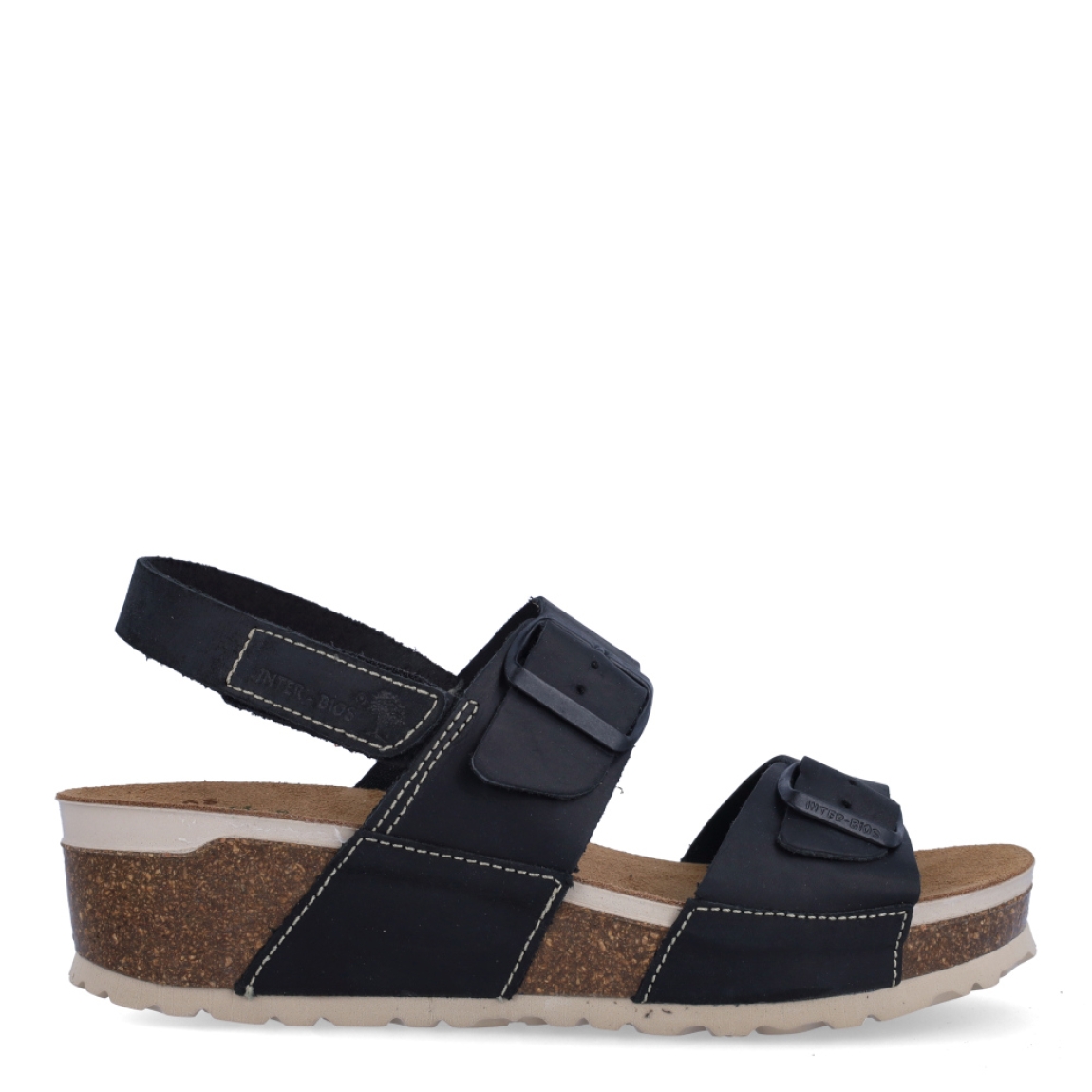 Sandalias de la marca Inter Bios, modelo LINA. Sandalias elaboradas en piel color negro. Cierre de las sandalias con doble hebilla en pala y velcro en el talón. Sandalias con cuña de 4cm de altura. Estas sandalias Inter Bios es un esencial para tus looks de temporada, si deseas disfrurae de una comodidad máxima en tu día a día.