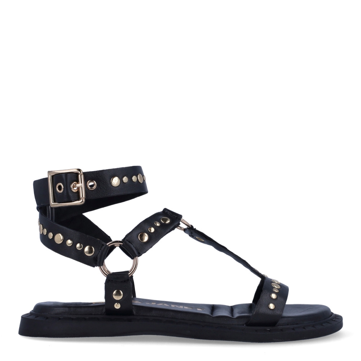 Sandalias de la marca Janet & Janet, modelo SASHA. Exterior en piel color negro con detalle de tachuelas doradas en tiras. Interior en piel color negro con estampado de logo marca. Cierre con hebilla. Suela de sandalias de goma y plana. Estas sandalias Janet & Janet tienen un diseño auténtico, que hará destacar tus looks a donde vayas!