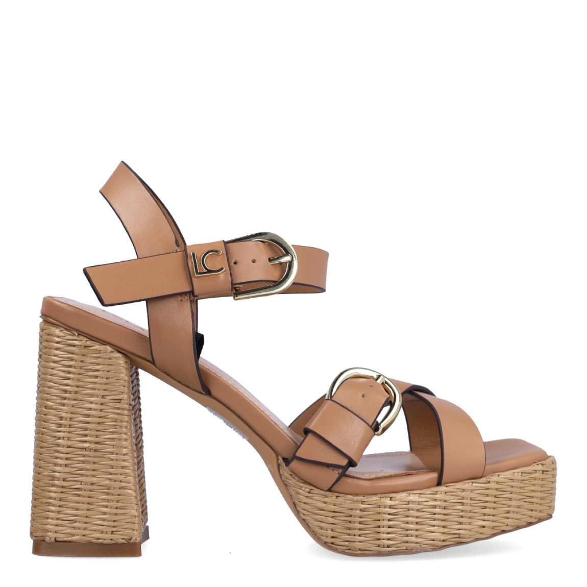 Sandalias de la marca Lola Casademunt, modelo PIURA. Exterior en piel color camel con tiras cruzadas. Interior en color nude. Cierre con doble hebilla, una en la pala y otra en el tobillo. Sandalias Lola Casademunt con tacón de 9cm de altura. Estas sandalias Lola Casademunt PIURA, son un complemento para lucir tus looks con estilo y comodidad.