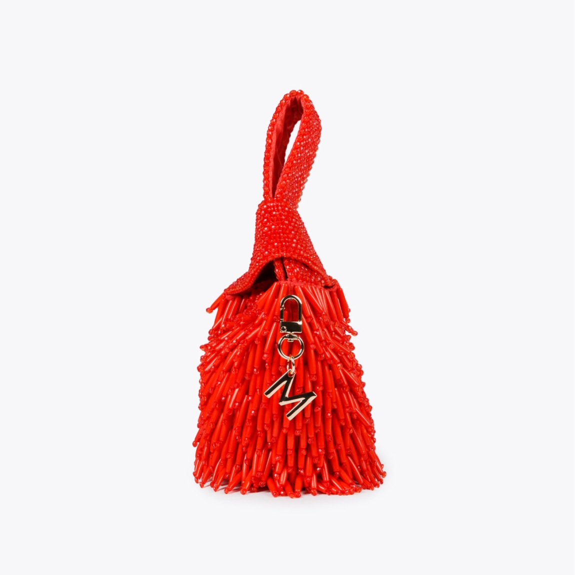 Bolso de la marca Lola Casademunt, modelo CORAL. Exterior en textil de color rojo con incrustraciones de pedrería rojo. Bolso con asa de mano. Cierre imantado. Medidas del bolso Lola Casademunt, ALTO: 17 cm - LARGO: 20 cm - ANCHO: 16 cm. Este bolso Lola Casademunt CORAL es un complemento ideal para tus looks de fiesta!