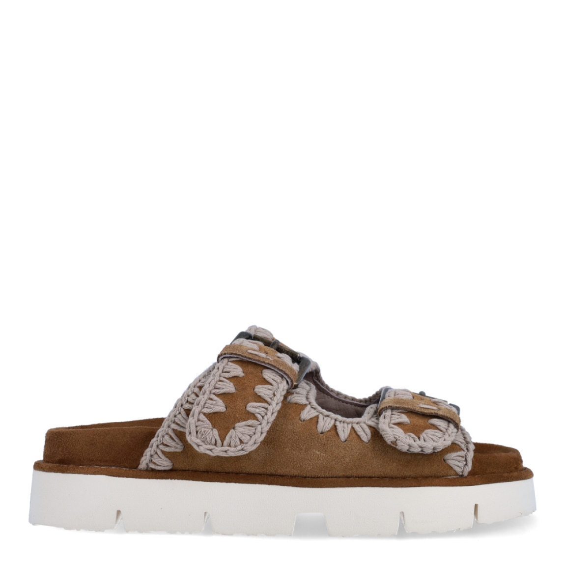 Sandalias Mou. modelo 10A. Estas elegantes sandalias bio est'an elaboradas de ante color marron con dos hebillas están fabricadas a mano con cuero de primera calidad y la característica costura de ganchillo de la marca. Este modelo cuenta con una ligera suela exterior de EVA y una plantilla acolchada de ante para mayor comodidad. Sandalias con plataforma de 3cm. Estas sandalias Mou 10A son ideales para esta temporada!