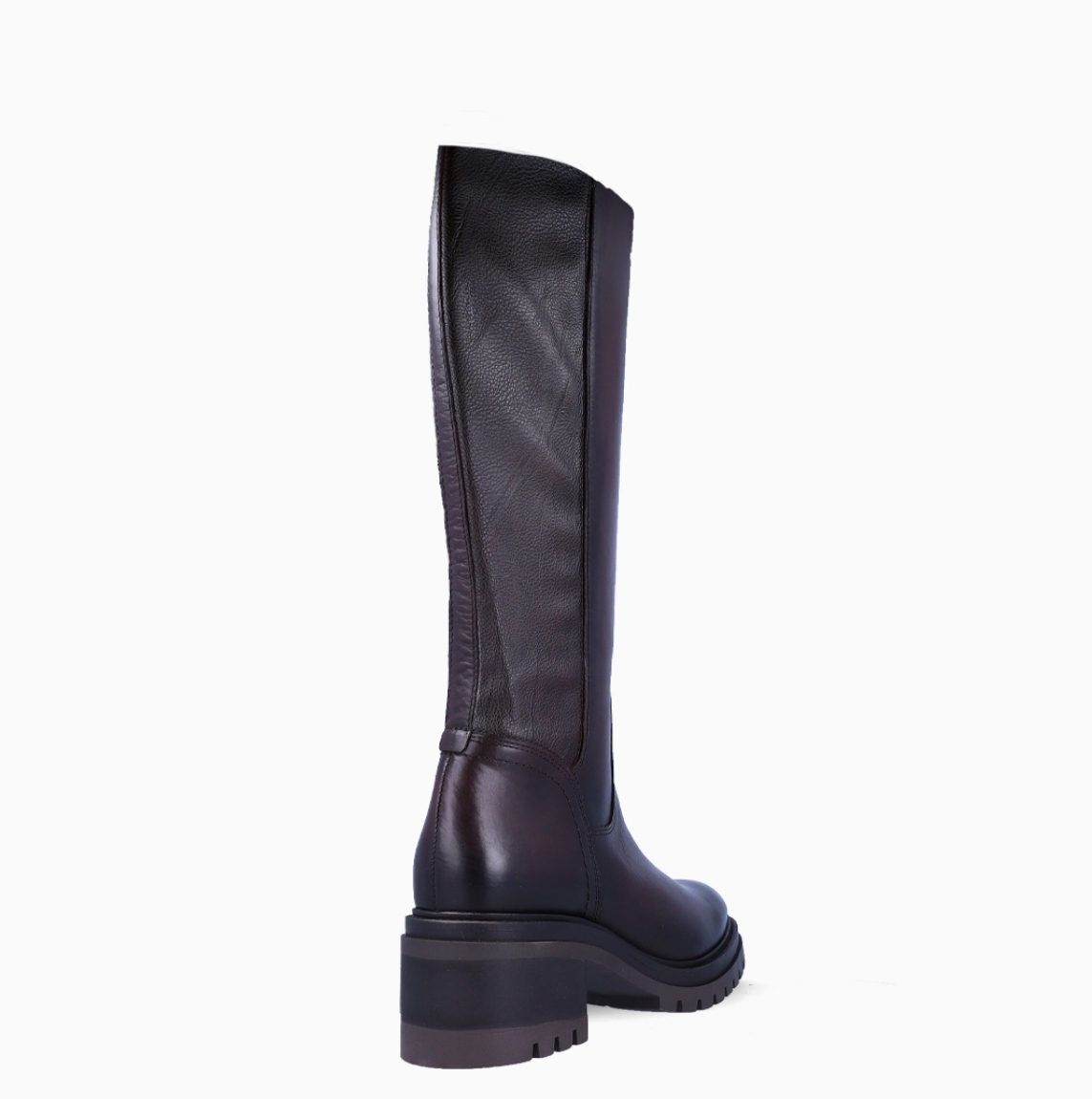 Botas mosquetera de la marca Tamaris, modelo FINNA. Exterior en piel color marrón con puntera redonda. Interior en piel color marrón. Botines con cierre de cremallera y suela dentada con cuña de 6cm de altura. Estas botasTamaris FINNA son un clásico que no debe faltar en tu armario!