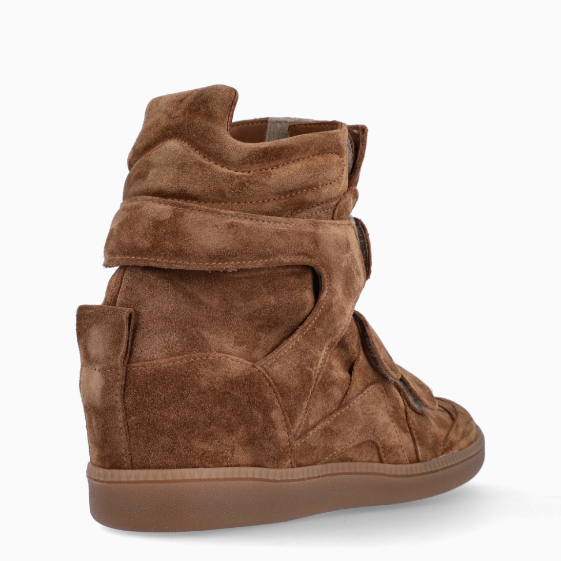 Botines de la marca Itse, modelo G8. Exterior elaborado en ante color cuero con cierre de velcros por toda la pala. Suela de goma con cuña de 6cm. Estas botad Itse son un complemento ideal para esta temporada!