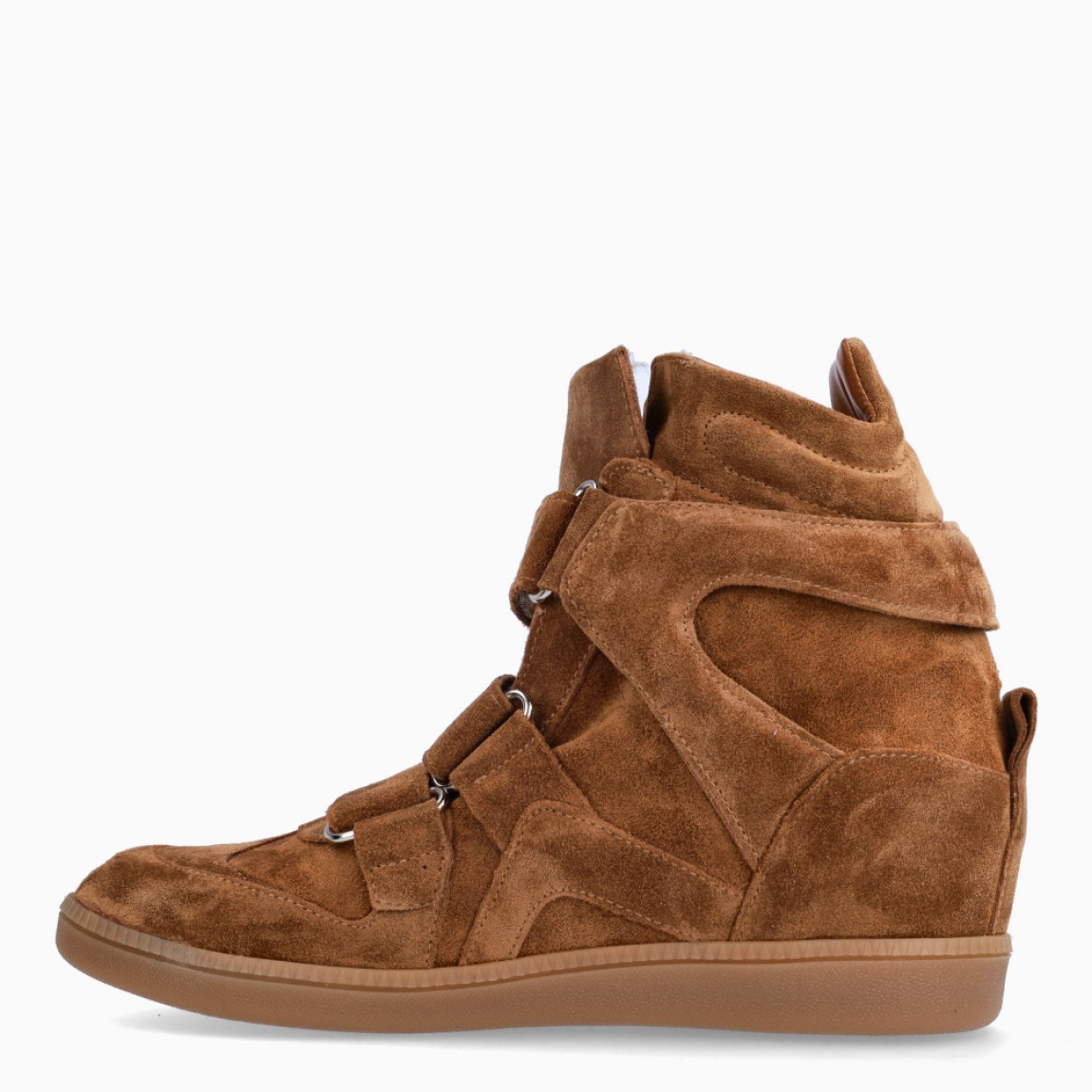 Botines de la marca Itse, modelo G8. Exterior elaborado en ante color cuero con cierre de velcros por toda la pala. Suela de goma con cuña de 6cm. Estas botad Itse son un complemento ideal para esta temporada!