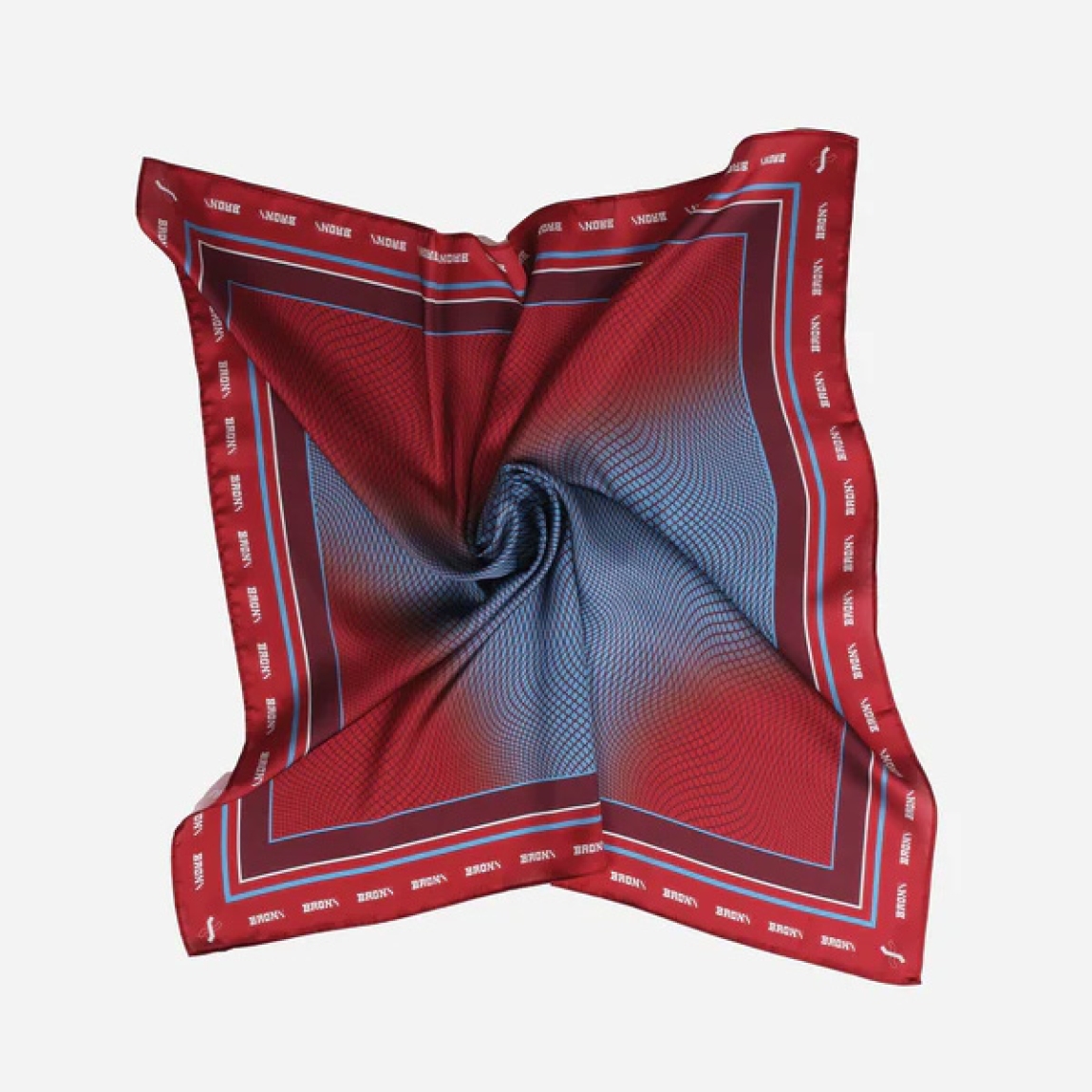 Pañuelo de la marca Bronx, modelo XTRA. Elaborado en tela color azul con estampado de diseños y logo de la marca. Accesorio versátil y clásico.