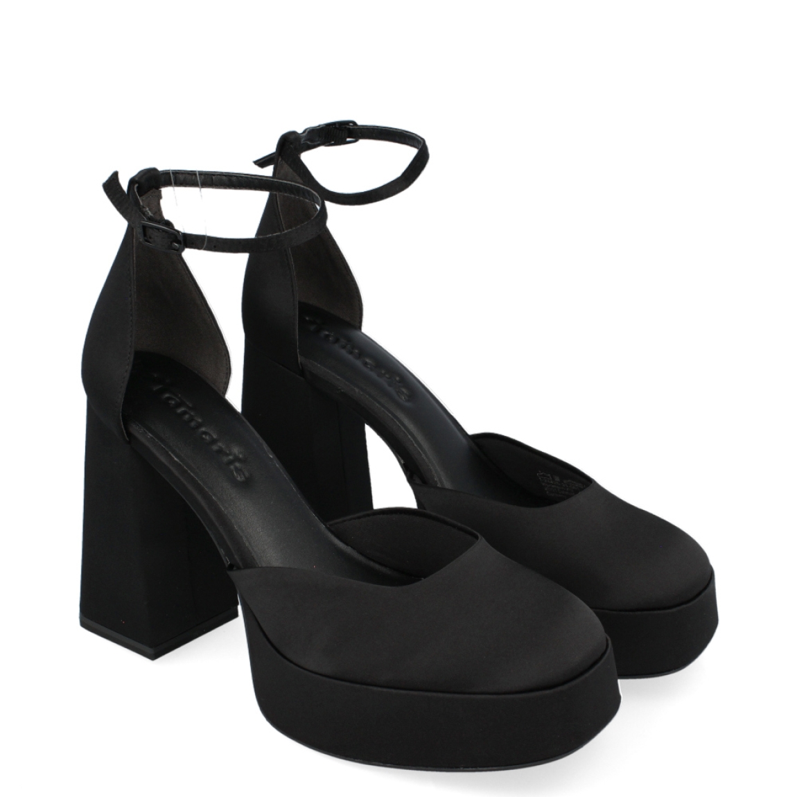 Sandalia de la marca Tamaris, modelo Muna. Exterior de la sandalia de tela de color negro. Interior de la sandalia de tela de color negro. Cierre de la sandalia con hebilla en el tobillo. Sandalia con plantilla acolchada para garantizar el máximo confort. Sandalia con tacón alto y ancho de 11 cm de altura, incluyendo unos 3 cm de plataforma. La sandalia de fiesta de Tamaris es una sandalia vegana, cómoda y un básico para todas las ocasiones.