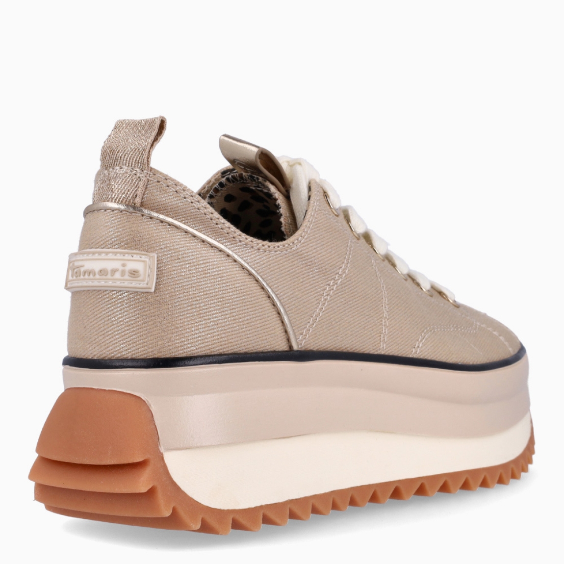 Depotivas de la marca Tamaris, modelo RAFA. Exterior de las deportivas en textil colro oro. Interior de las deportivas en textil con diseño animal print. Cierre de las deportivas con cordones en color blanco. Suelas de las deportivas Tamaris hechas de goma y dentadas. Deportivas con plataforma de 4,5cm de altura. Estas deportivas Tamaris Rafa, además de se cómodas, tienen un estilo único que te ayudarán a destacar en tu día a día.