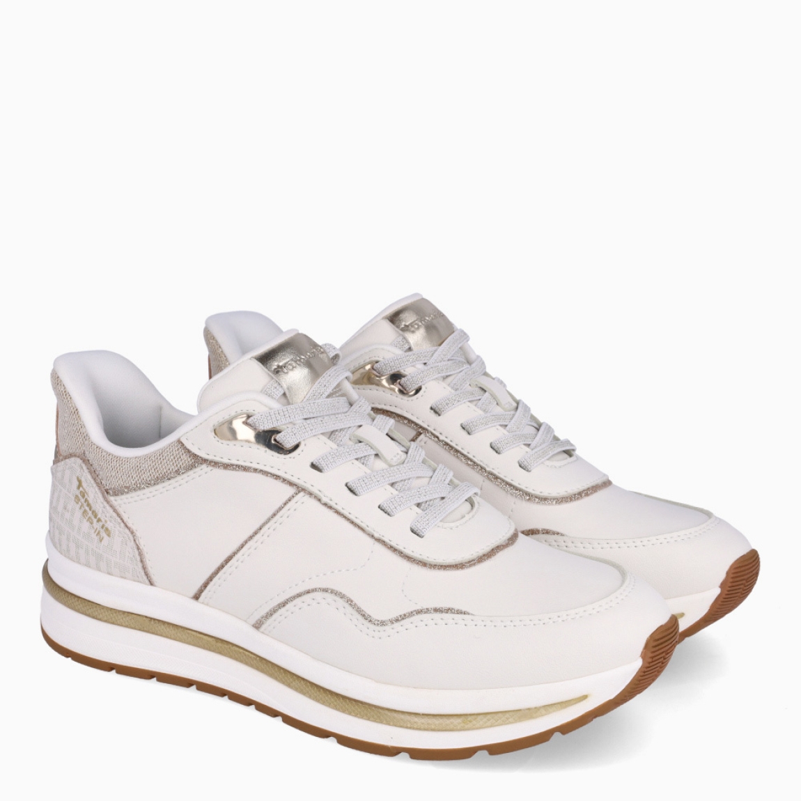 Deportivas de la marca Tamaris, modelo MAGGIE. Exterior en piel colo blanco con detalle de escarchado. Interior de las deportivas en piel color blanco con plantilla acolchada y extraíble para máxima comodidad. Cierre de las deportivas con cordones y suela plana de goma. Estas deportivas Tamaris MAGGIE son un complemento ideal para tu día a día. No pueden faltar en tu armario!