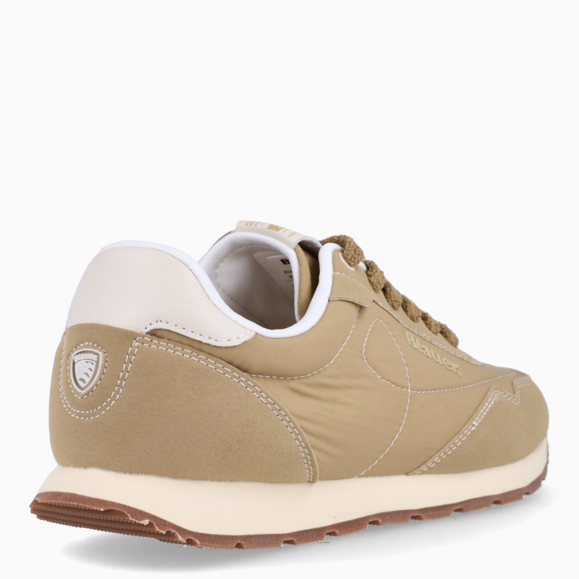 Deportivas de la marca Blauer, modelo SOFT. Exterior de las deportivas en naylon color beig con detalle de color blanco en tobillo. Interior de las deportivas en piel color blanco con plantilla acolchada y extraíble para máxima comodidad. Cierre de las deportivas con cordones color beig. Deportivas con suela plana dentada de goma. Logo Blauer en el lateral exterior de la deportiva. Este modelo SOFT de Blauer es ideal para tu comodidad del día a día!