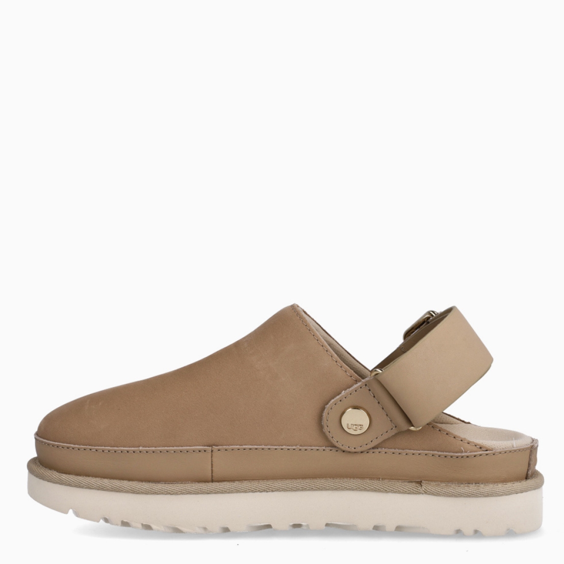 Zuecos de la marca UGG, modelo GOLDENSTAR. Zuecos elaborados en forro textil confeccionado con fibras de poliéster 100 % reciclado color beig. Logotipo de UGG grabado. Tira ajustable en el talón, cierre de hebilla, extremo de la tira de TPU con letras UGG. Plantilla textil elaborada con fibras de poliéster 100 % reciclado. Suela de goma con plataforma. Estos zuecos UGG GOLDENSTAR son un complemento ideal en comodidad y estilo!