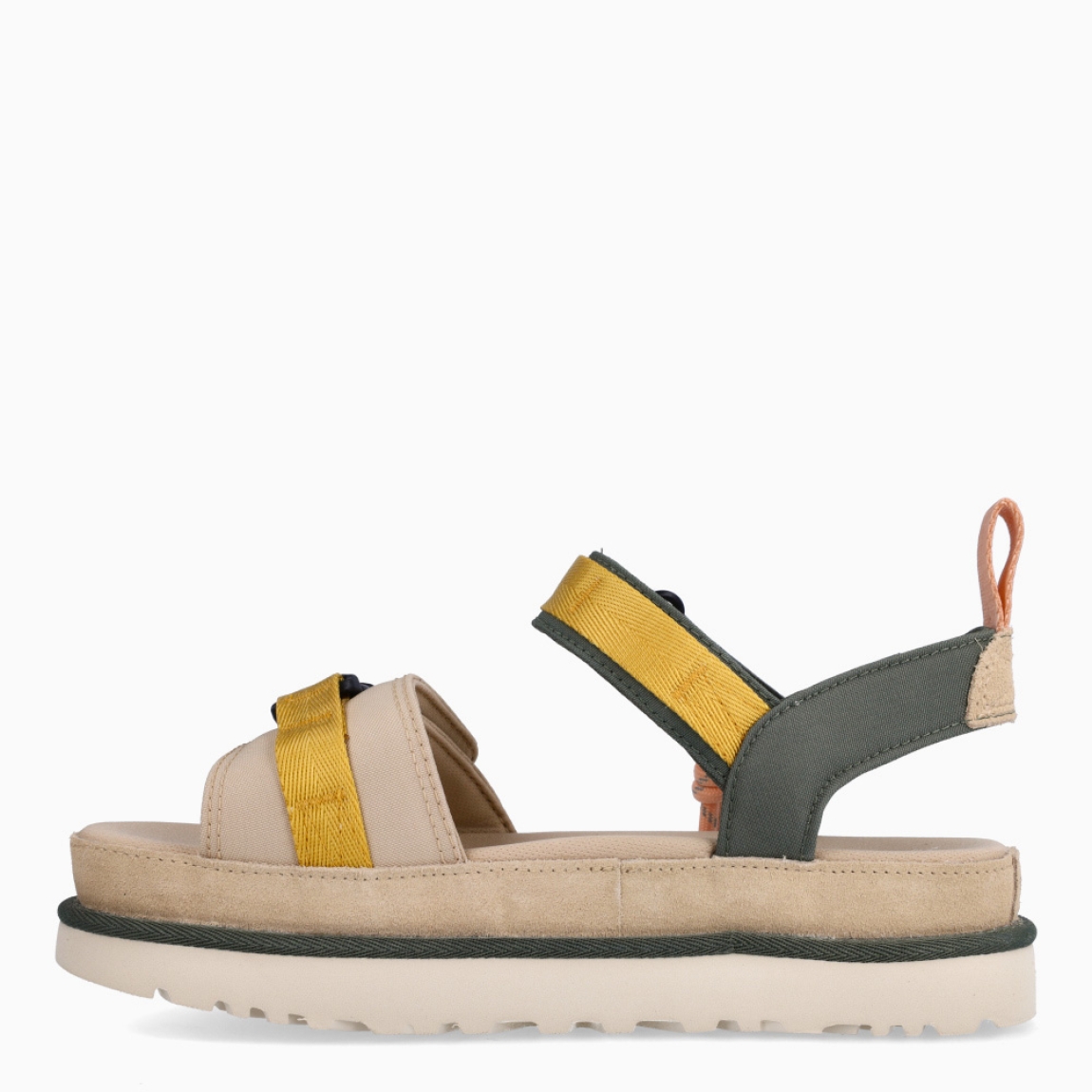 Sandalias de la marca UGG, modelo MULTI. Elaboradas en naylon multicolor. Sandalias con forro textil hecho de fibras de poliéster 100 % reciclado. Cierre de sandalias UGG con doble velcro en pala. El tejido de la plantilla está fabricado con fibras de poliéster 100 % reciclado, la plantilla cuenta con un tratamiento antiolores a base de menta. Suela de goma EVA de caña de azúcar. Estas sandalias UGG MULTI son un complemento ideal para gozar de comodidad absoluta!