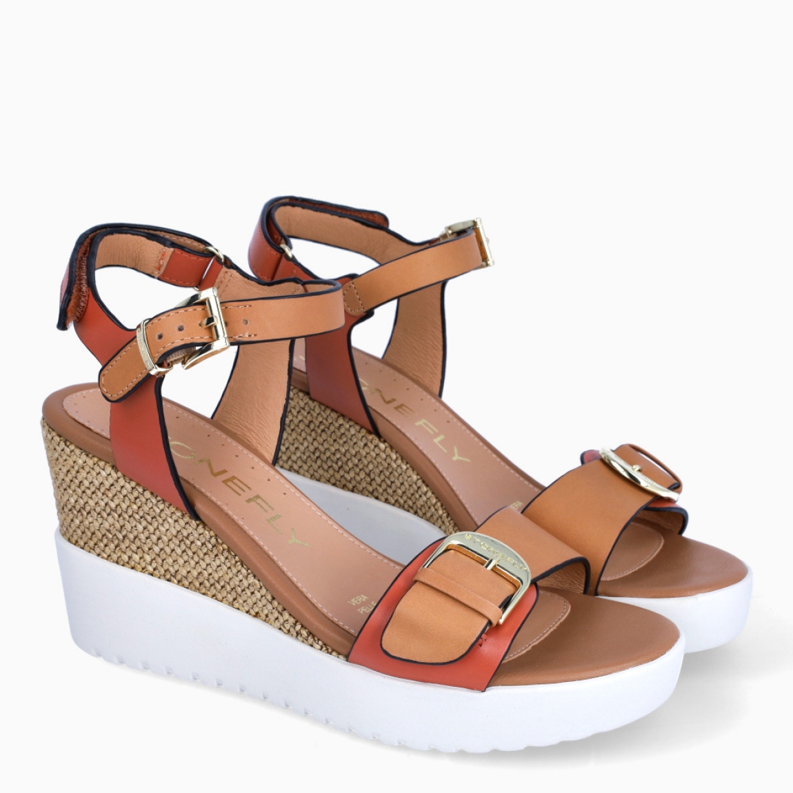 Sandalias de la marca Stonefly, modelo LOURDES. Elaboradas en piel color cuero con detalle de hebilla en pala. Interior en piel color camel. Cierre con hebilla en tobillo y velcro en talón. Suela con cuña de 8cm de altura. Estas sandalias Stonefly LOURDES son un complemento ideal para ti!