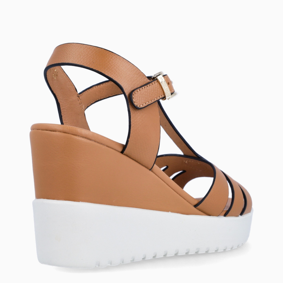 Sandalias de la marca Stonefly, modelo MARIN. Elaboradas en piel color cuero con detalle de tiras cruzadas en pala. Interior en piel color camel. Cierre con hebilla en tobillo. Suela con cuña de 8cm de altura. Estas sandalias Stonefly MARIN son un complemento ideal para ti!