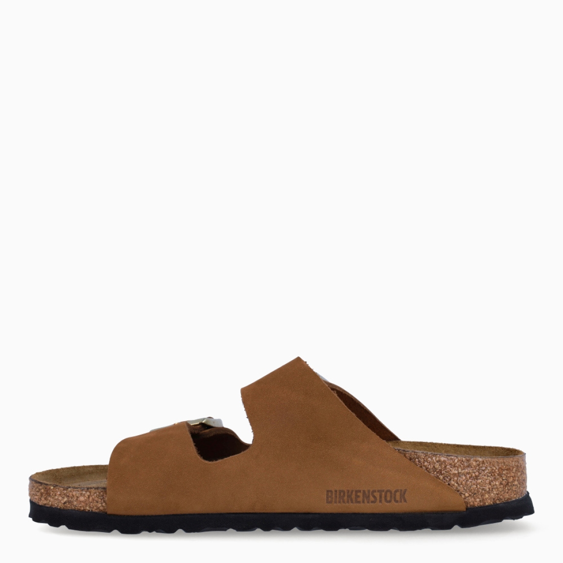 Sandalias de la marca Birkenstock, modelo ARIZONA BIRKO. Sandalias elaboradas en piel de alta calidad color camel, con base de corcho y látex de forma anatómica. Cierre de las sandalias con doble hebilla de espiga de metal con ajuste individual, en empeine y pala. Estas sandalias Birkenstock ARIZONA BIRKO son un complemento ideal para esta temporada, su diseño simple atemporal, lo hace el accesorio clásico para tus looks!