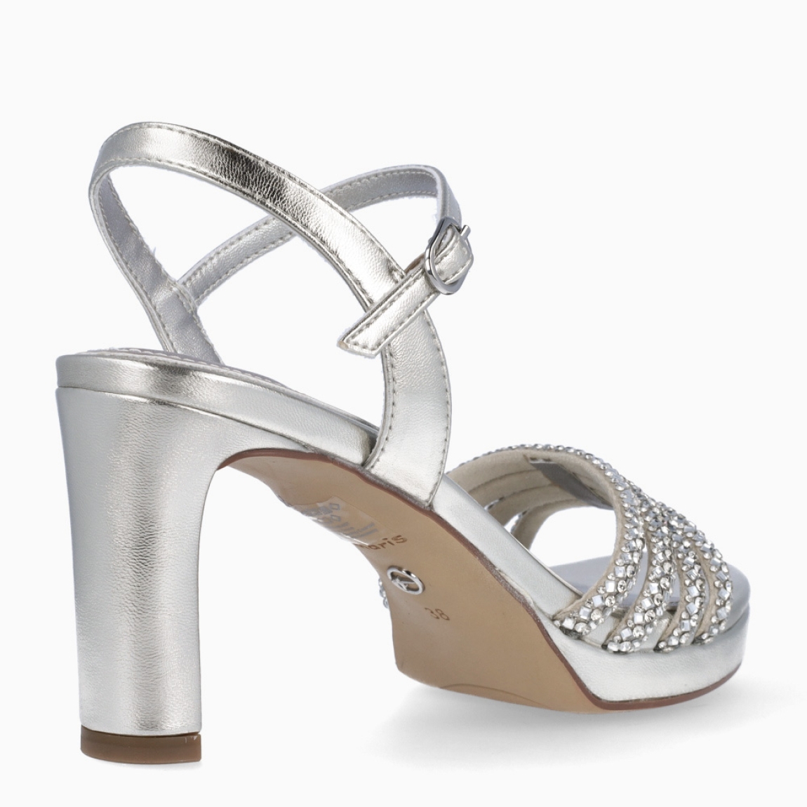 Sandalias de la marca Tamaris, modelo MAGDA. Sandalias elaboradas en ecopiel color plata con tiras en la pala con piedrería brillante. Interior en piel color plata. Cierre de sandalias Tamaris con hebilla en tobillo y tacón de 9cm de altura. Sandalias Tamaris MAGDA complemento ideal para lucir tus looks en eventos!