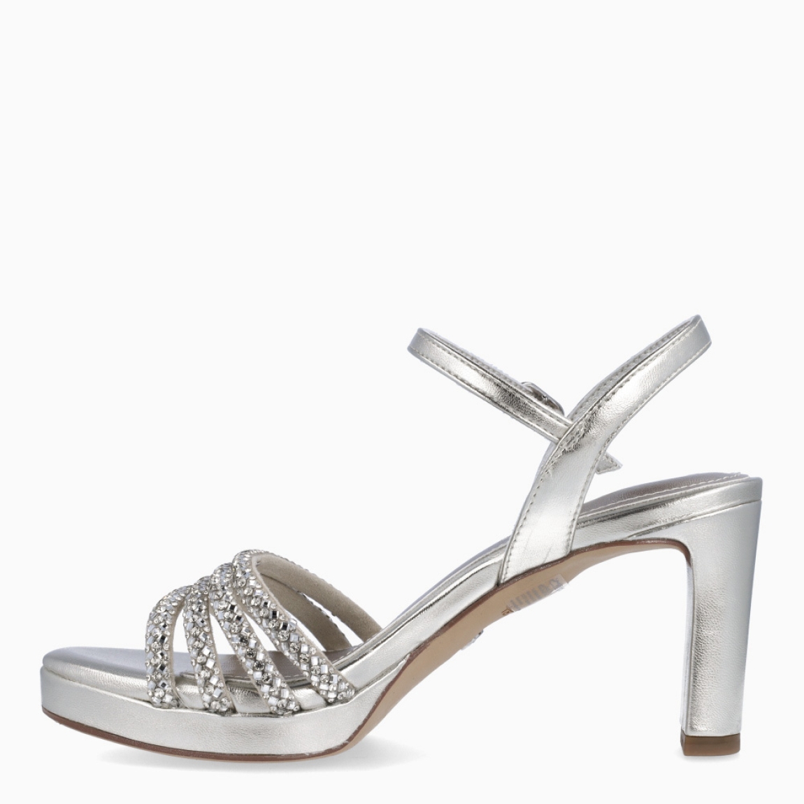 Sandalias de la marca Tamaris, modelo MAGDA. Sandalias elaboradas en ecopiel color plata con tiras en la pala con piedrería brillante. Interior en piel color plata. Cierre de sandalias Tamaris con hebilla en tobillo y tacón de 9cm de altura. Sandalias Tamaris MAGDA complemento ideal para lucir tus looks en eventos!