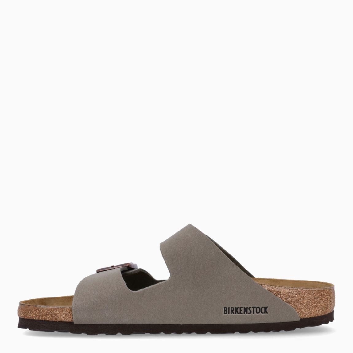 Sandalias de la marca Birkenstock, modelo ARIZONA BIRKO. Exterior de las sandalias en piel color taupe con base de corcho en forma anatómica. Cierre de las sandalias Birkenstock con dos hebillas de espiga metálica con ajuste individual. Estas sandalias Birkenstock ARIZONA está diseñada con material resistente y respetuoso con la piel. El complemento ideal que necesitas para tus looks llenos de comodidad esta temporada.