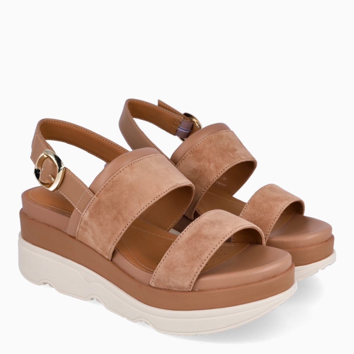 Sandalias de la marca Geox, modelo UFUR. Elaboradas en ante color beig con doble tira en pala. Interior en piel color camel. Sandalias Geox con cierre de hebilla en tobillo y suela con plataforma de 6cm de altura. Sandalias Geox UFUR, complemento clásico para tu día a día!