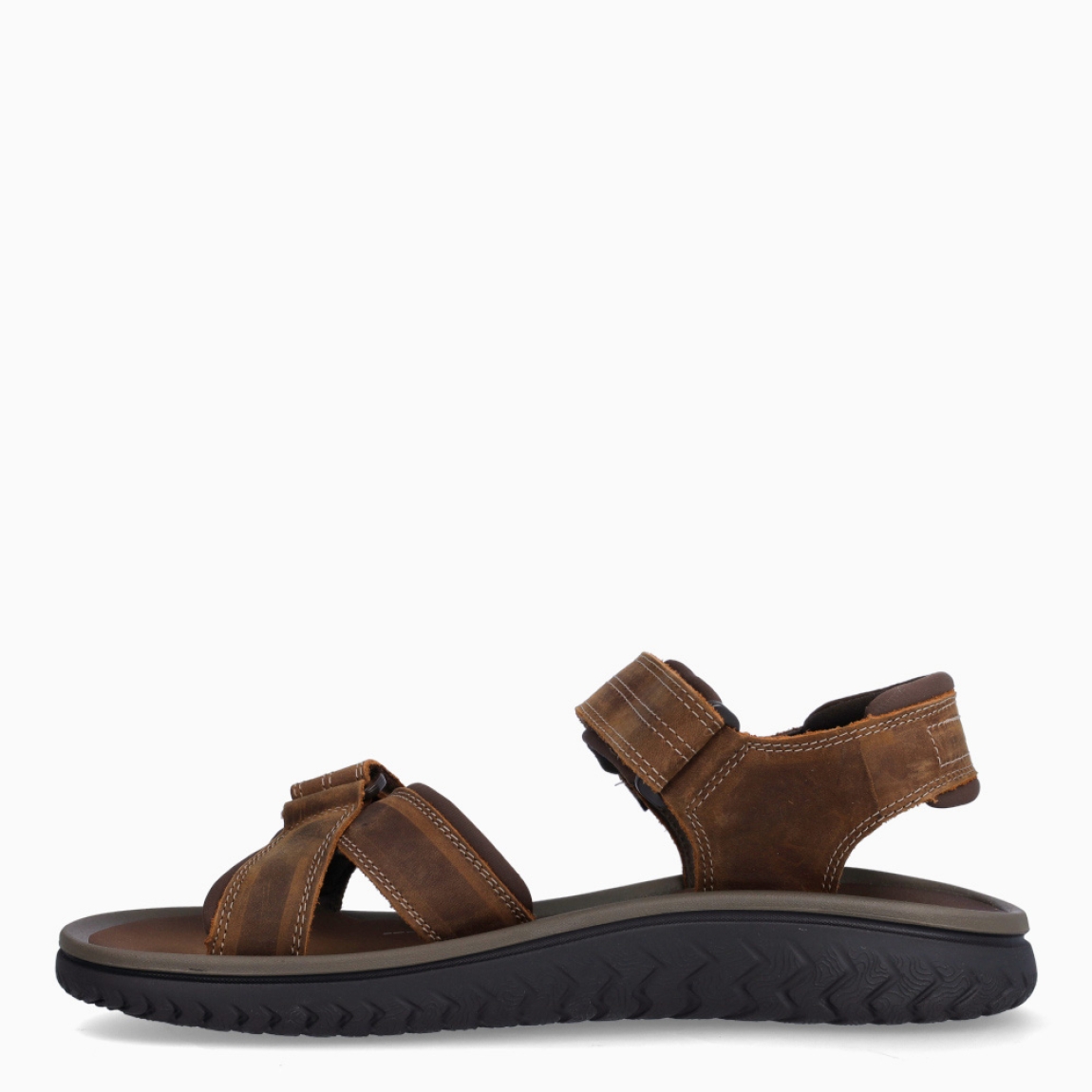 Sandalias de la marca Clarks, modelo I27. Sandalias elaboradas en nobuc color marrón con tiras en pala cruzadas. Cierre de las sandalias Clarks con doble velcro en pala y empeine. Suela de goma plana. Sandalias Clarks I27, complemento ideal para tu día a día esta temporada!