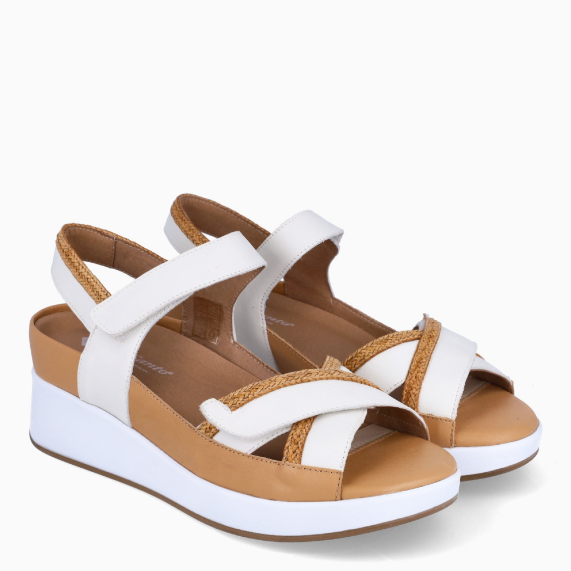 Sandalias de la marca PieSanto, modelo MARYELL. Exterior de las sandalias en piel color blanco con tiras cruzadas . Interior de las sandalias en piel color camel, con plantilla acolchada y extraíble para máxima comodidad. Cierre de las sandalias PieSanto con doble velcro en pala y empeine. Sandalias con plataforma de 5cm de altura. Estas sandalias PieSanto MARYELL son un complemento de temporada ideal para tu día a día, gracias a su ligereza, comodidad y diseño.