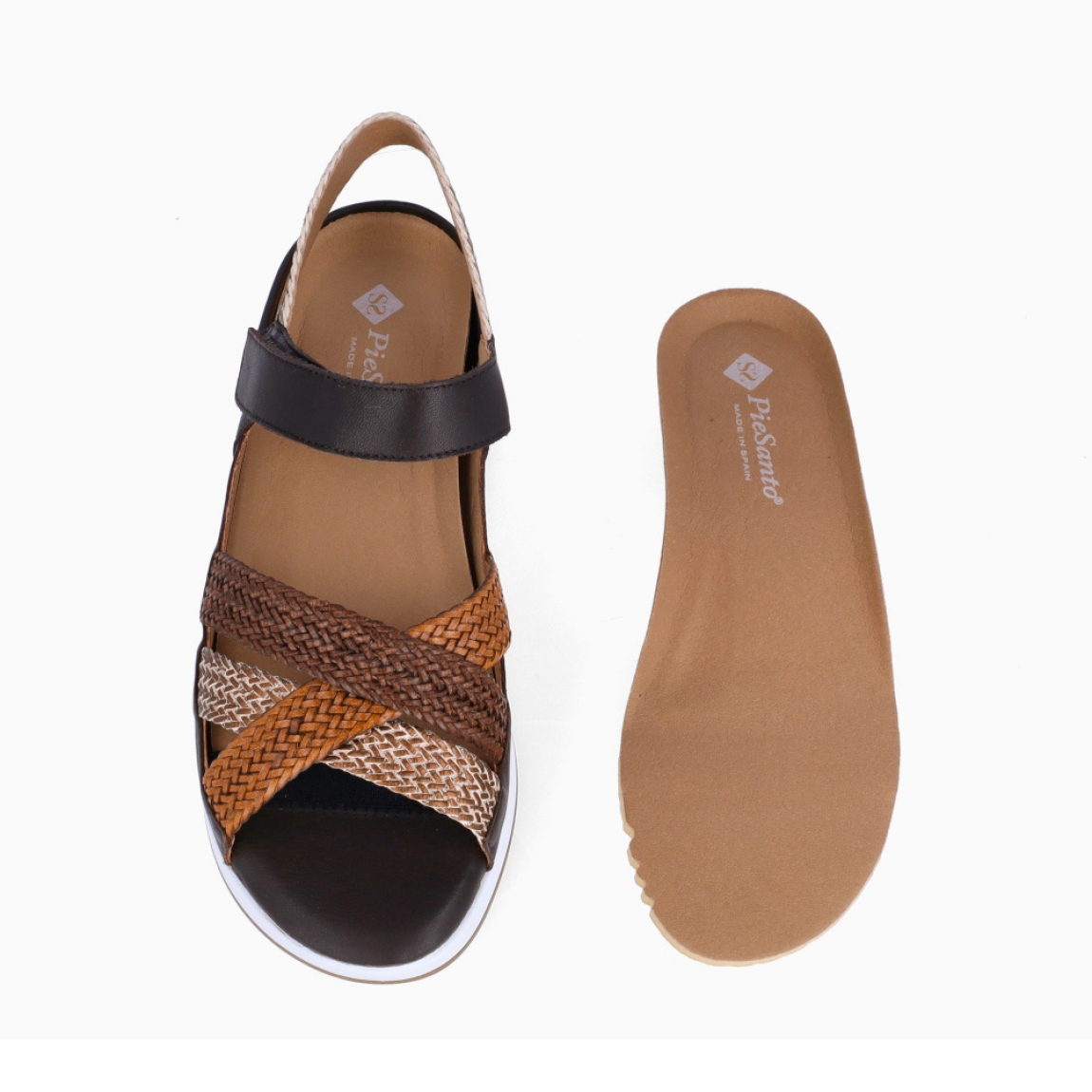 Sandalias de la marca Piesanto, modelo MINERVA. Elaboradas en piel trenzada color marrón con tiras cruzadas en pala. Interior con plantilla acolchada y extraíble para máxima comodidad. Suela con plataforma de 5cm de altura. Sandalias Piensanto MINERVA, complemento ideal de comodidad para tu día a día!