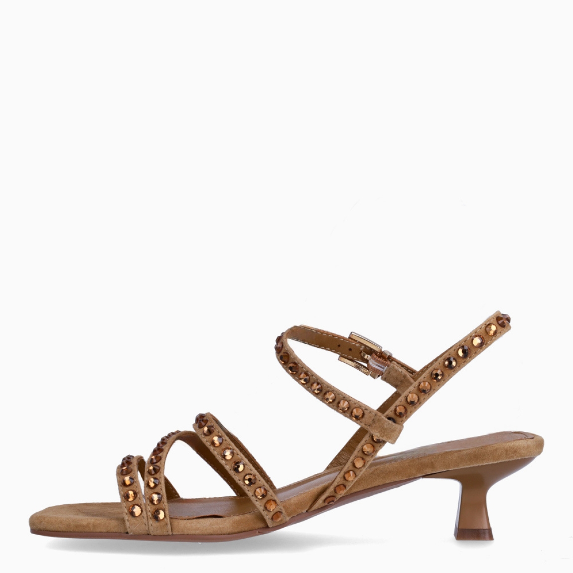 Sandalias de la marca Itse, modelo RACHEL. Sandalias elaboradas en piel color camel con tiras cruzadas en pala cubiertas de piedrería brillante. Interior en piel color camel. Cierre de sandalias Itse con hebilla en tobillo. Sandalias con tacón de 3cm de altura. Estas sandalias Itse RACHEL son ideales para estilizar tus looks!